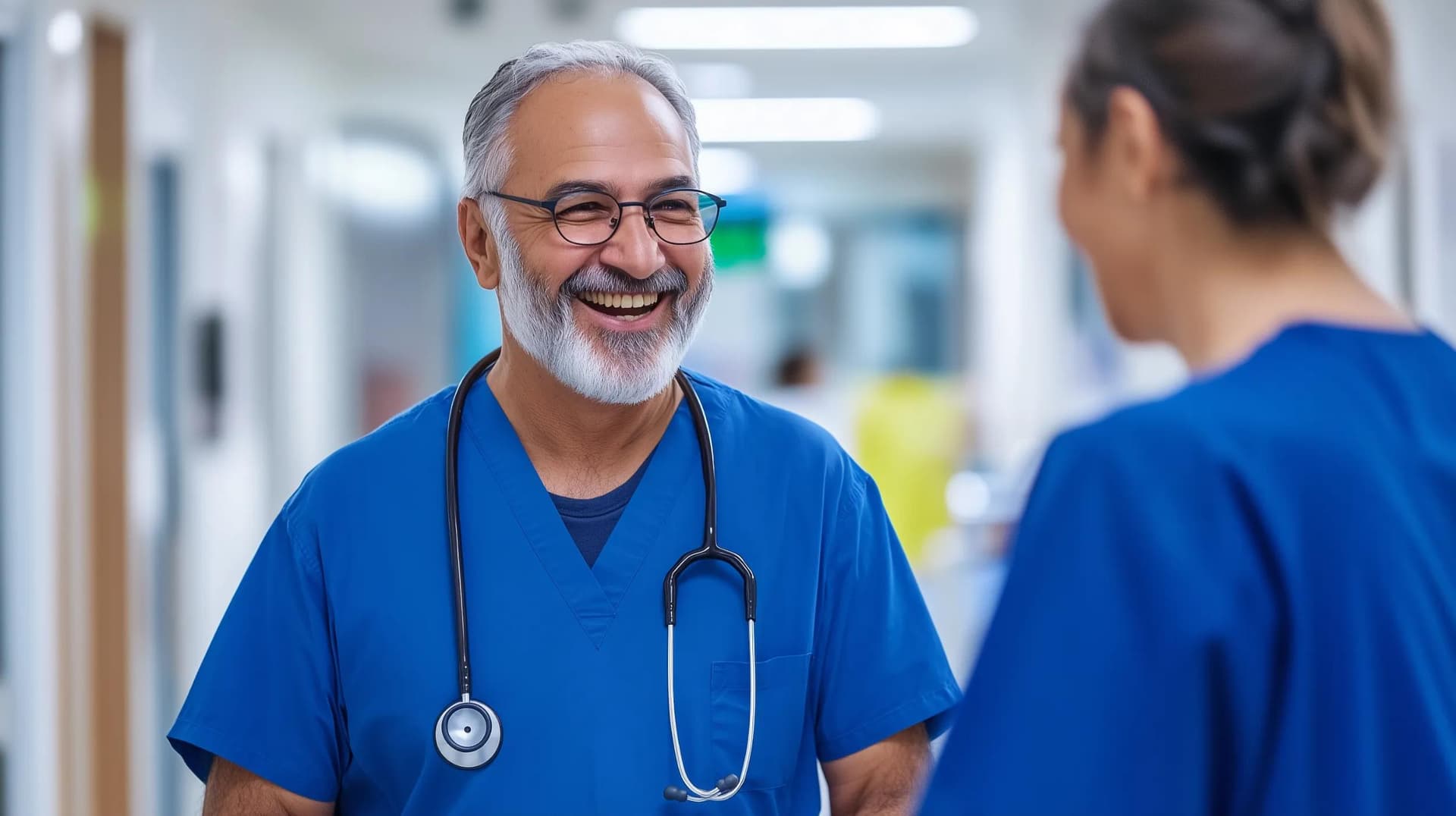 A healthcare professional engaged in a lively conversation with a colleague