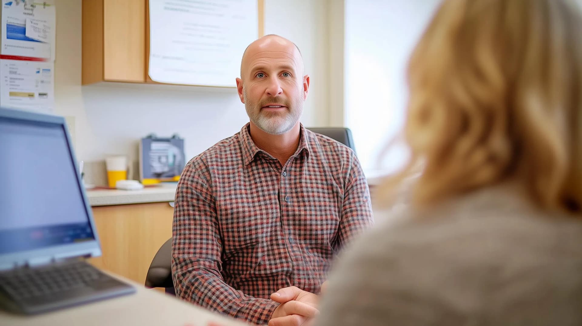 A patient in a consultation session with their doctor